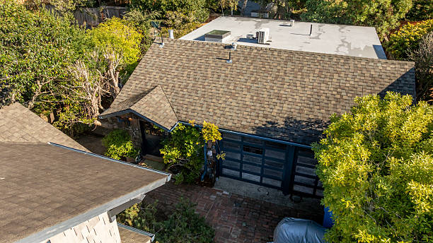 Photo of a modern renovated Accessory Dwelling Unit with wooden shingle walls in a garden setting in Austin TX